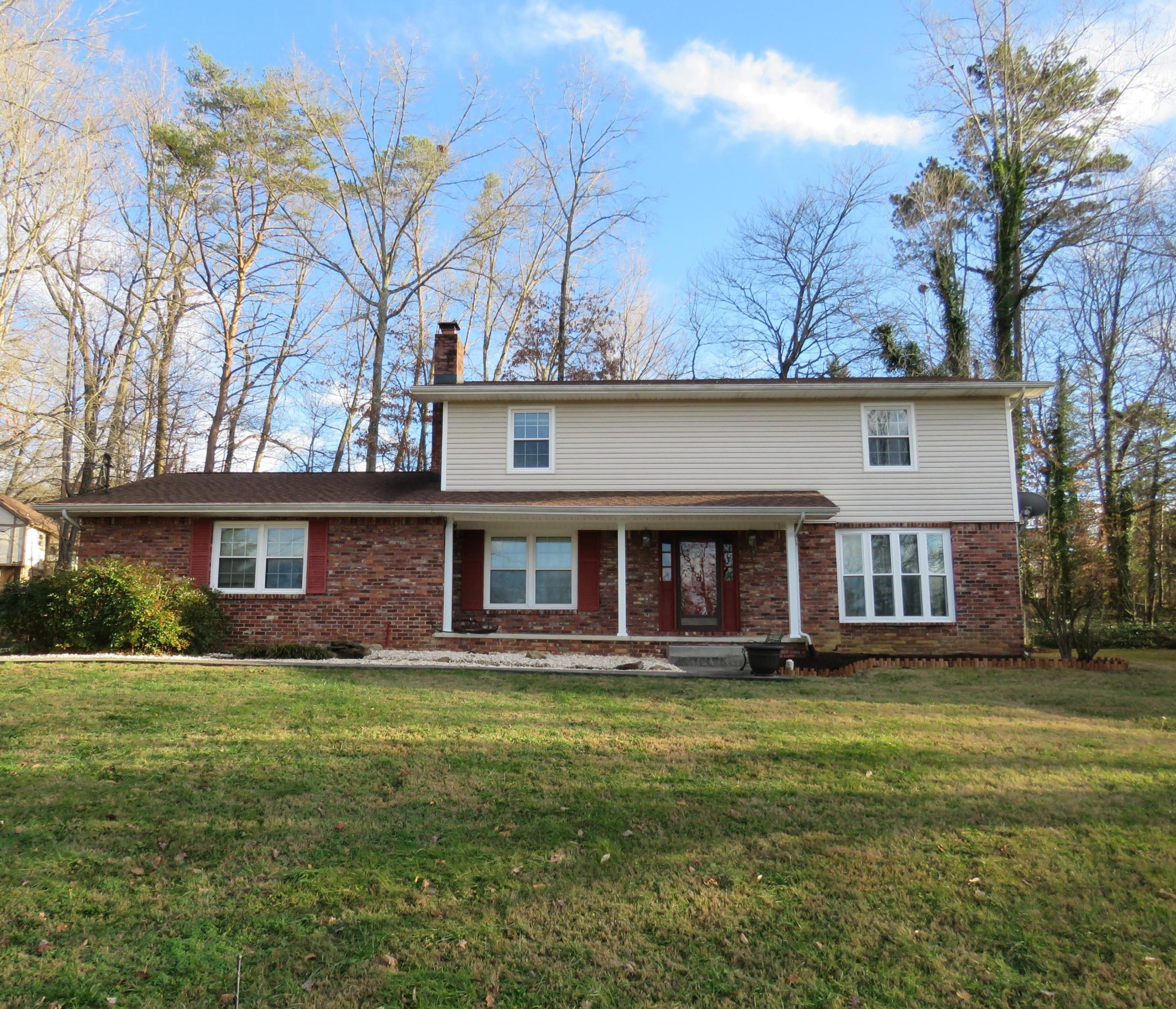 18 Clark Place Oak Ridge, TN 37830 - Photo 1 of 20 front view of a house with a yard