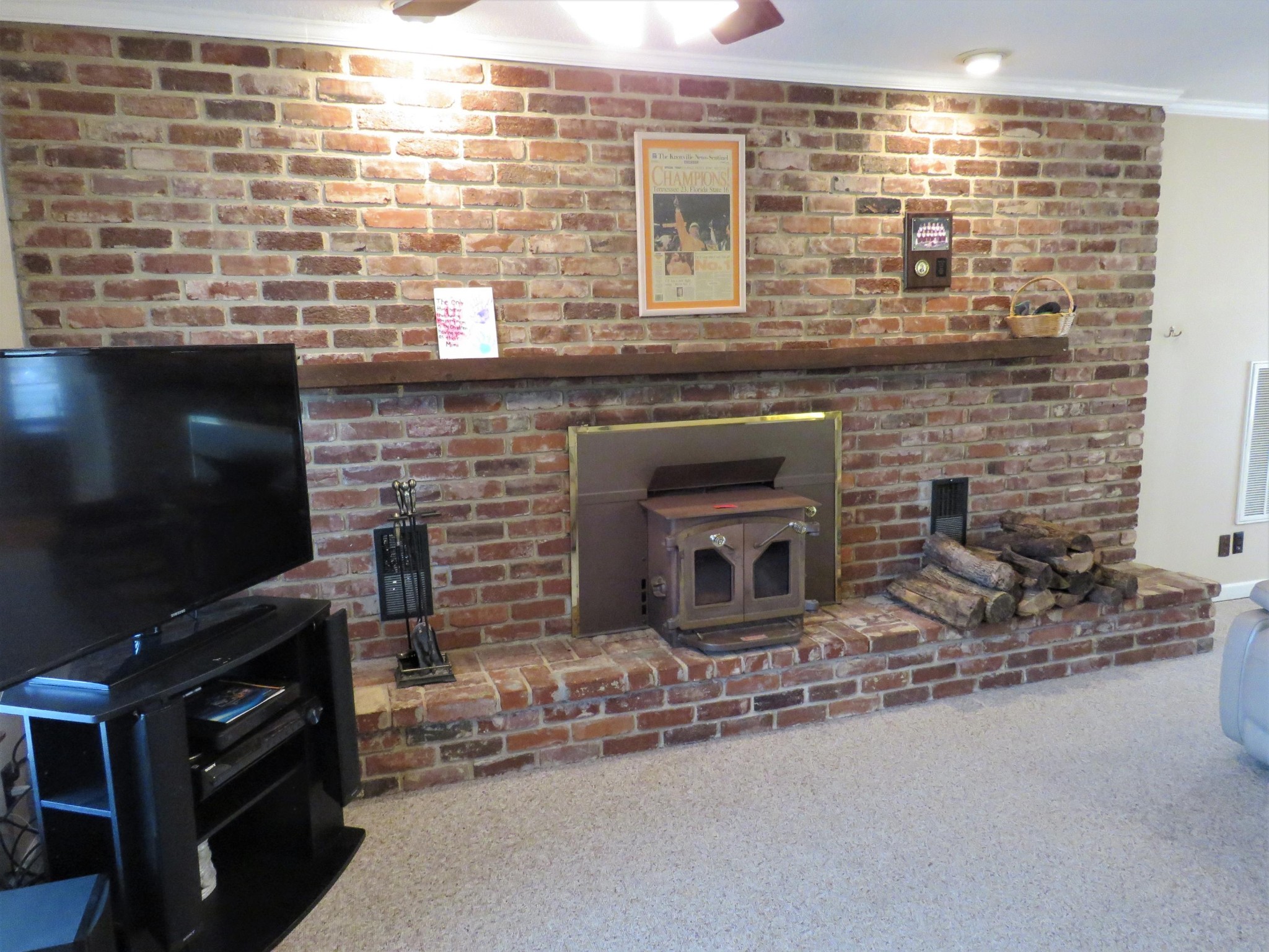 18 Clark Place Oak Ridge, TN 37830 - Photo 9 of 20 a living room with fireplace furniture and a flat screen tv