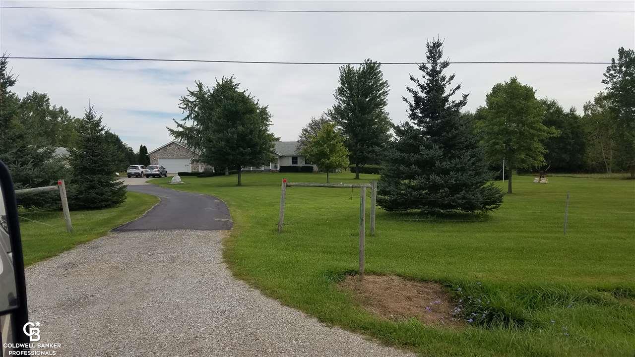 5610 Capac Road Capac, MI 48014 - Photo 11 of 28 This is a view from the road.
