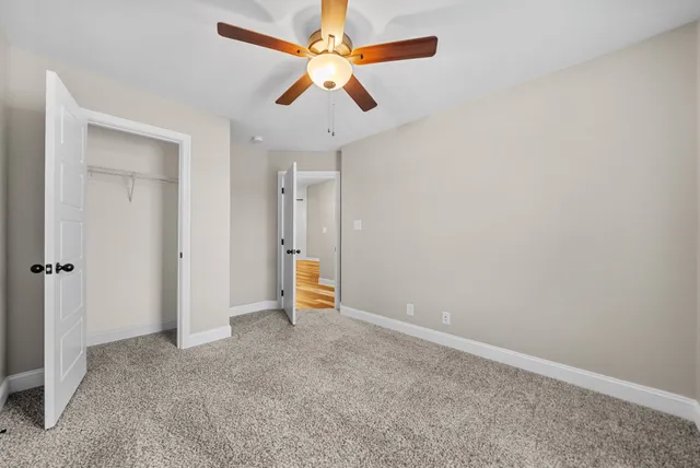 a bathroom with a sink toilet tub and shower