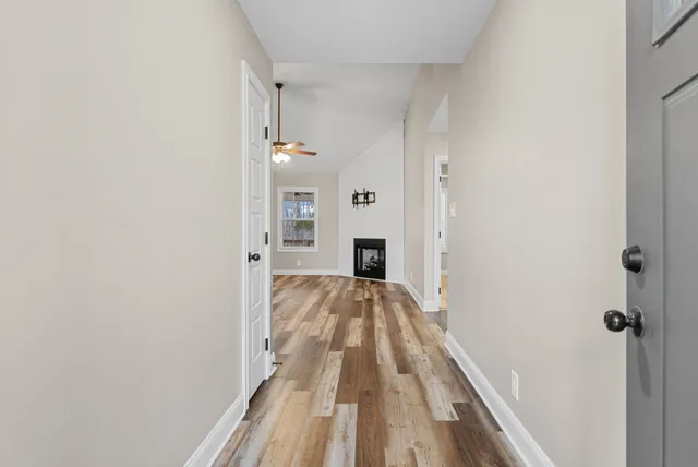 a view of a bedroom from a hallway