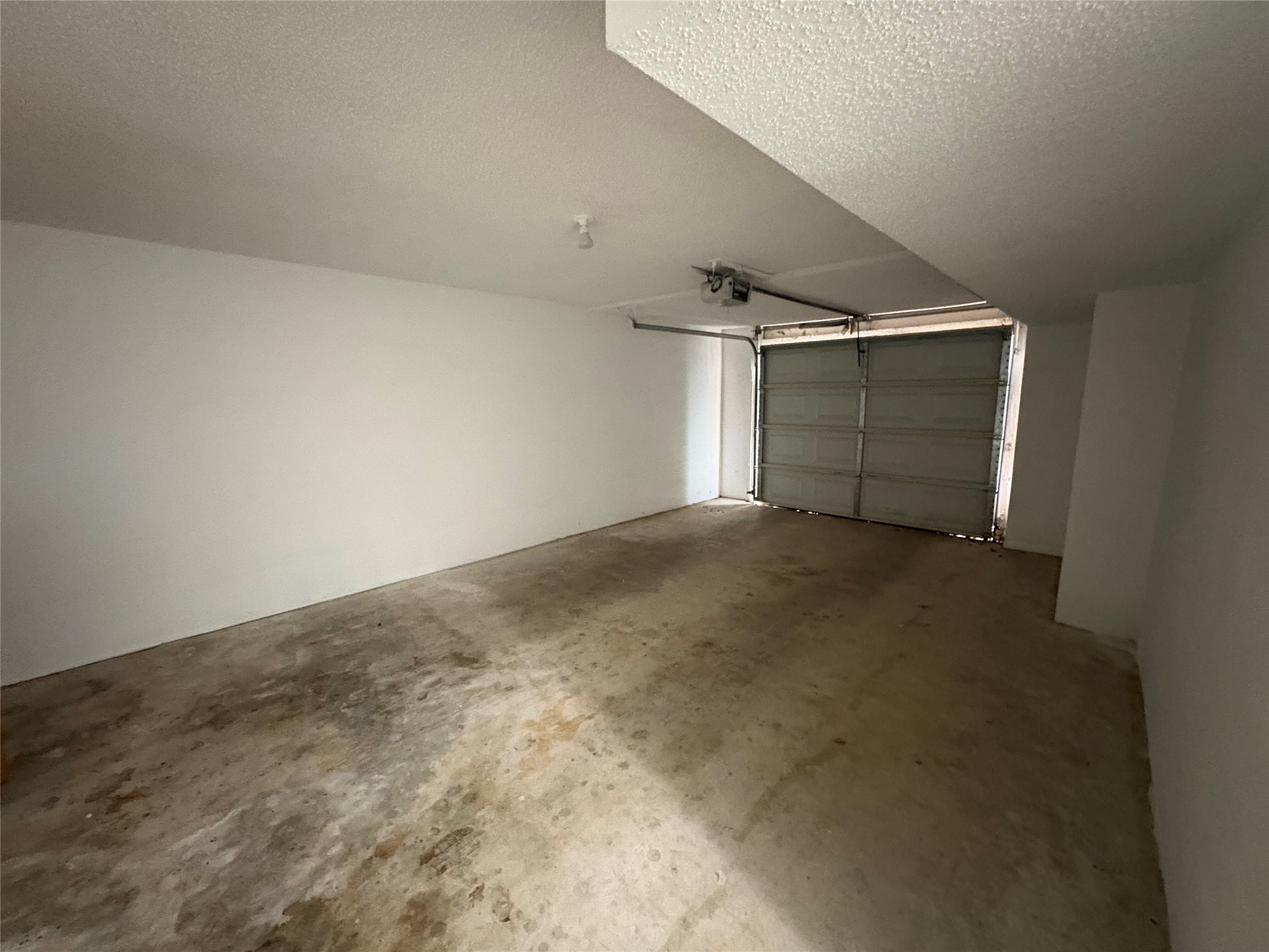 9201 Simmons Road, Unit 119 Austin, TX 78759 - Photo 22 of 22 View of garage