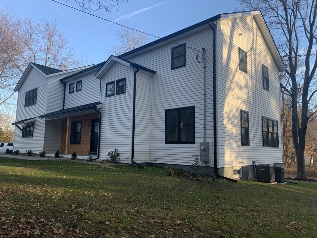 a front view of house with yard