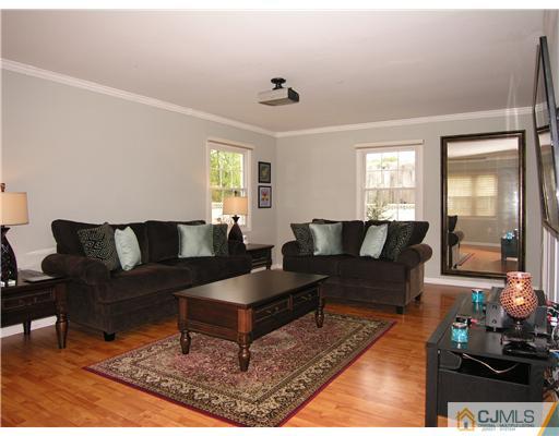 25 Tripplet Road Somerset, NJ 08873 - Photo 3 of 10 a living room with furniture and a large window