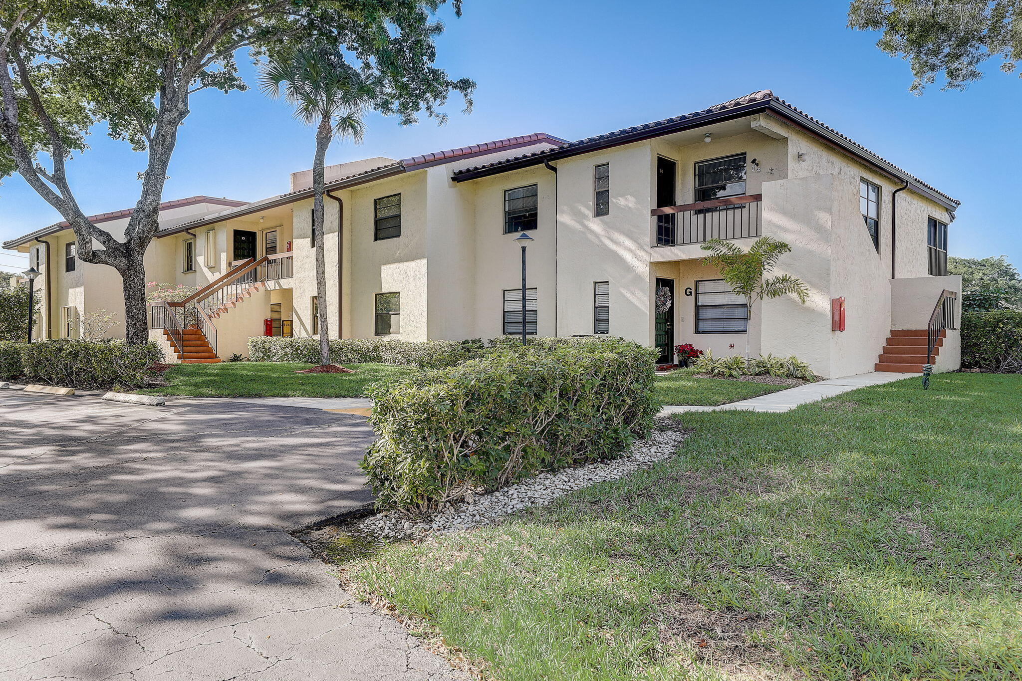 21731 Arriba Real, Unit 27H Boca Raton, FL 33433 - Photo 3 of 15 Front View