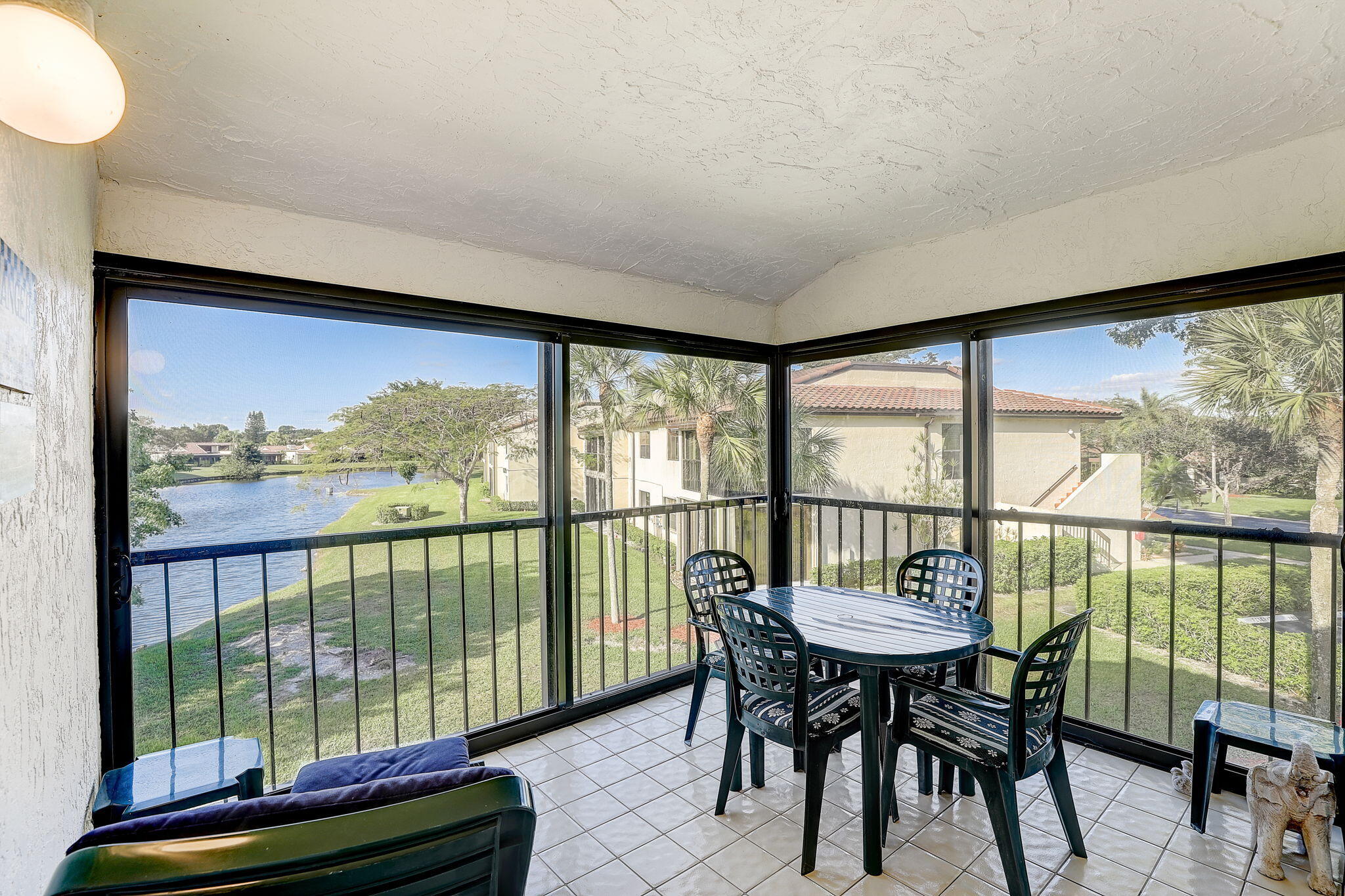21731 Arriba Real, Unit 27H Boca Raton, FL 33433 - Photo 4 of 15 Patio Water View!