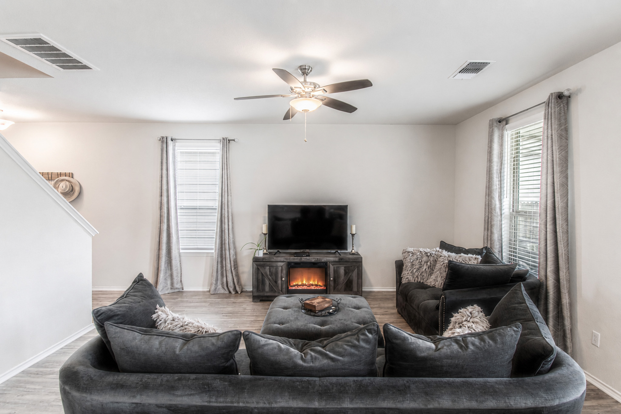 192 Spotted Rail Ridge Leander, TX 78641 - Photo 6 of 34 a living room with furniture and a flat screen tv
