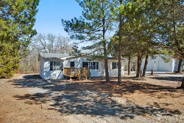 front view of a house with a small yard