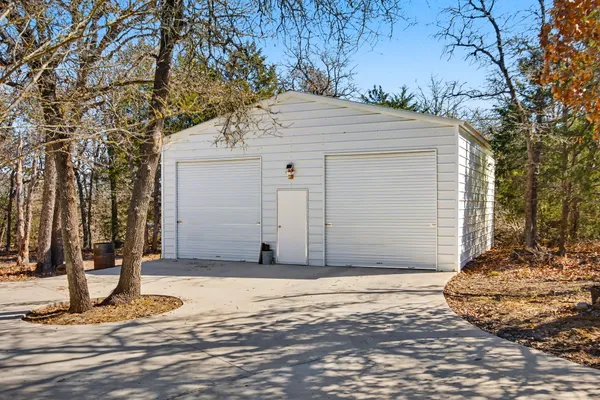 a view of a hall with chairs