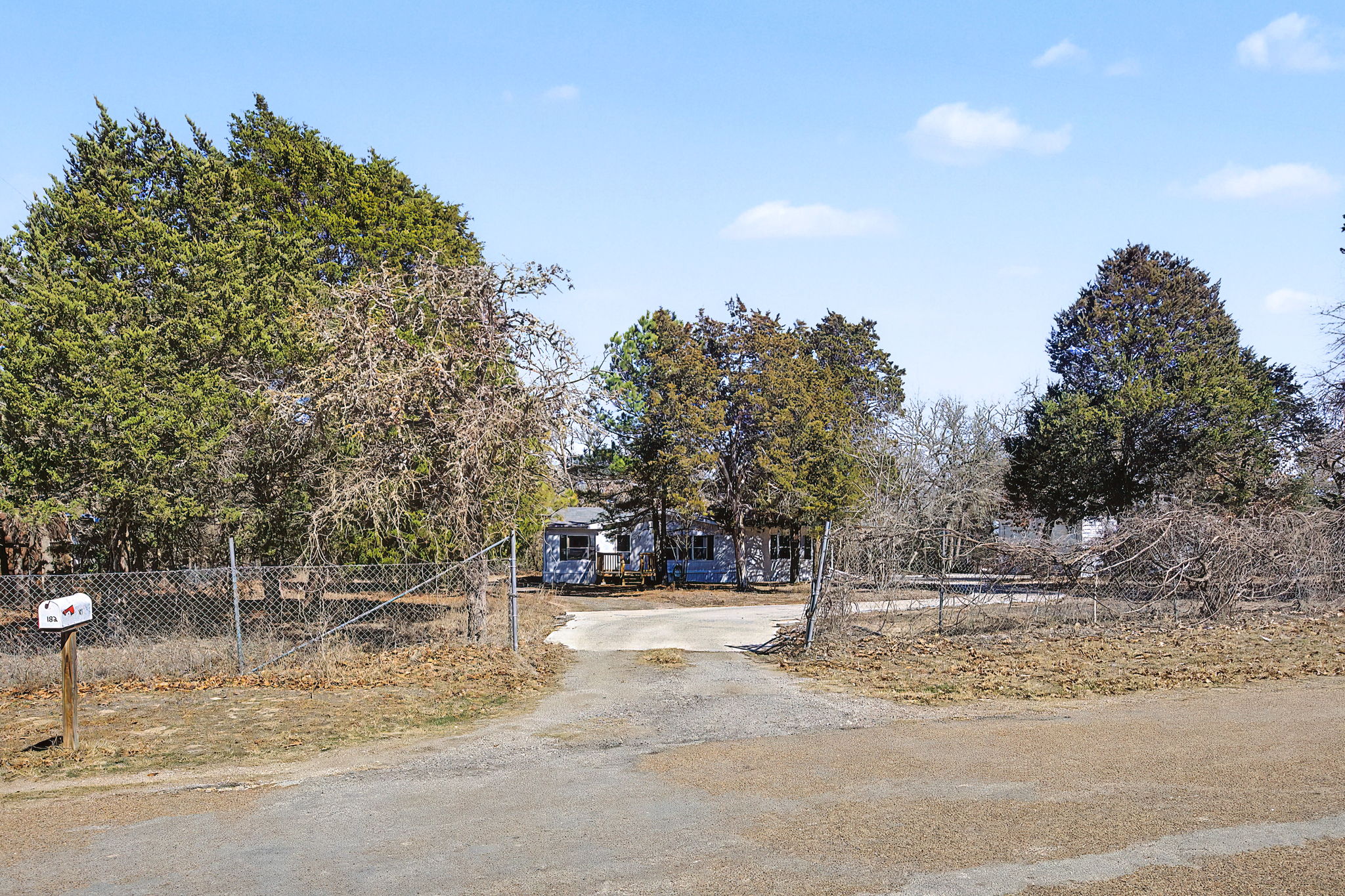 182 Wayside Court Elgin, TX 78621 - Photo 40 of 40 View of asphalt driveway