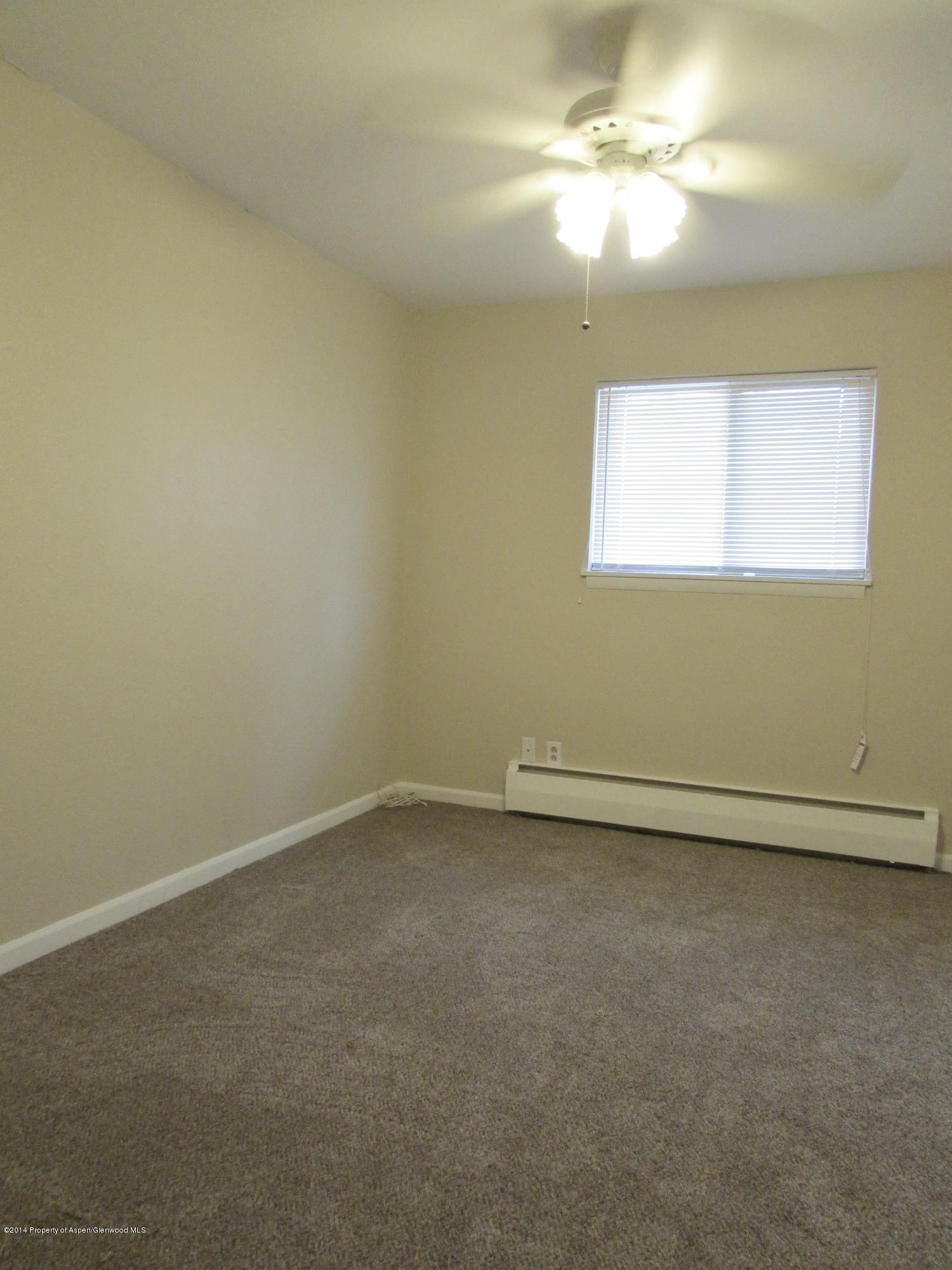 1318 East 7th Street Rifle, CO 81650 - Photo 9 of 19 a view of an empty room