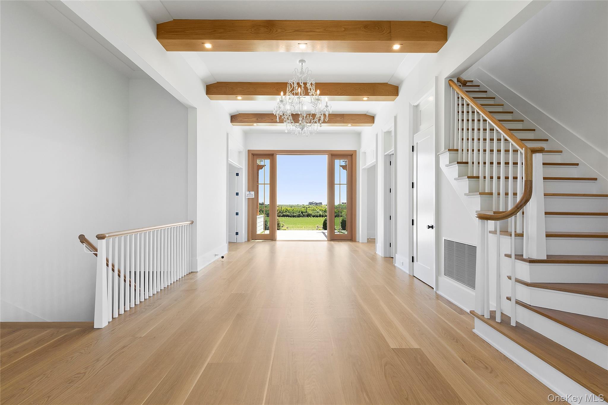 522 Wickapogue Road Southampton, NY 11968 - Photo 26 of 49 a view of a hallway view with wooden floor and staircase