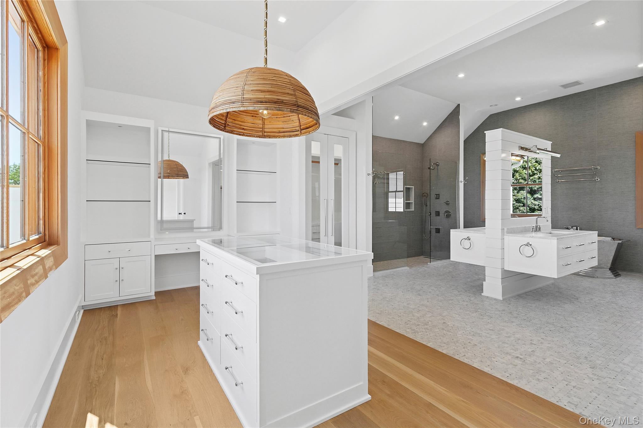 522 Wickapogue Road Southampton, NY 11968 - Photo 29 of 49 a large kitchen with stainless steel appliances a large counter top a stove and a window