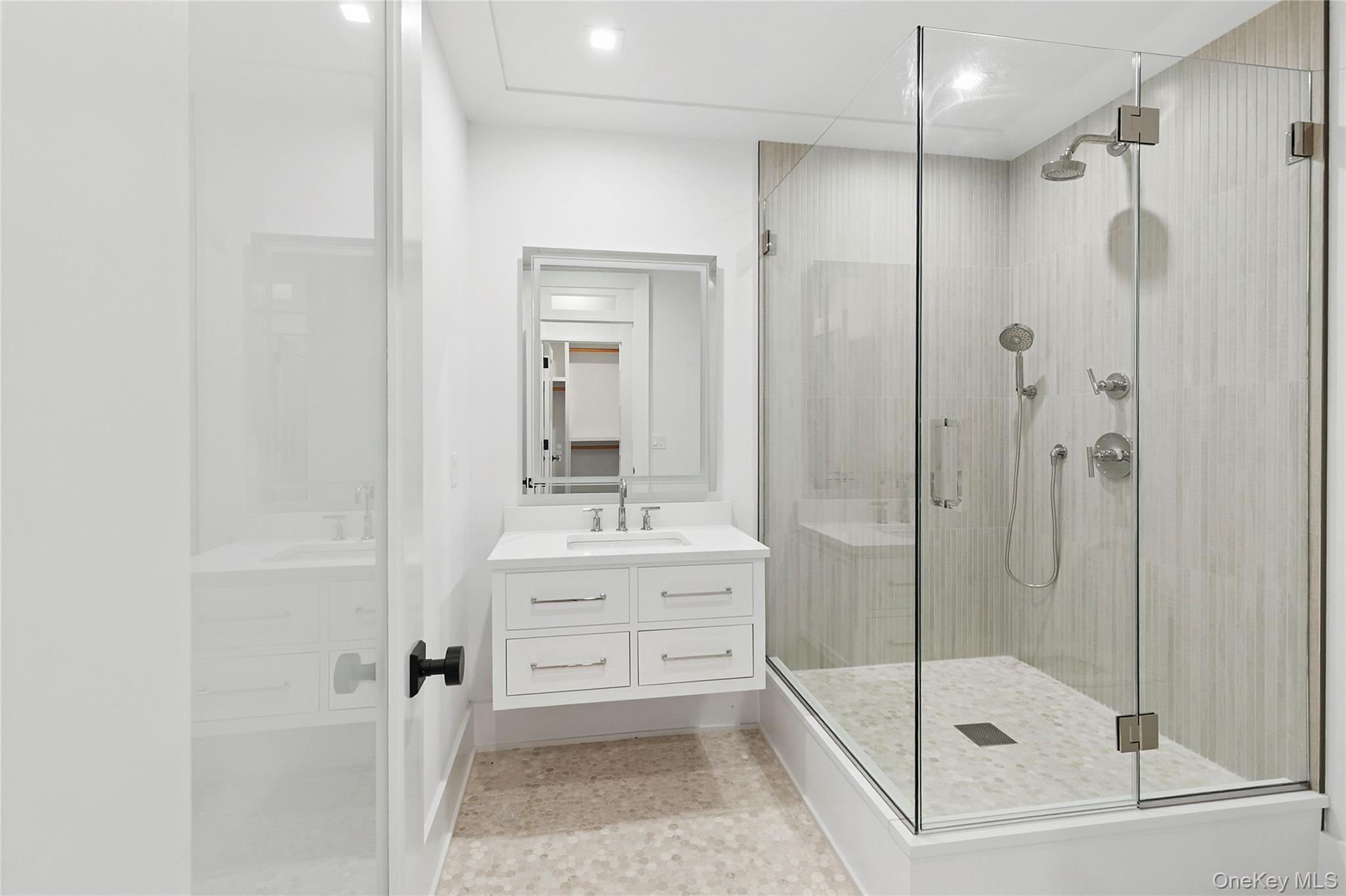 522 Wickapogue Road Southampton, NY 11968 - Photo 33 of 49 a bathroom with a shower and a sink