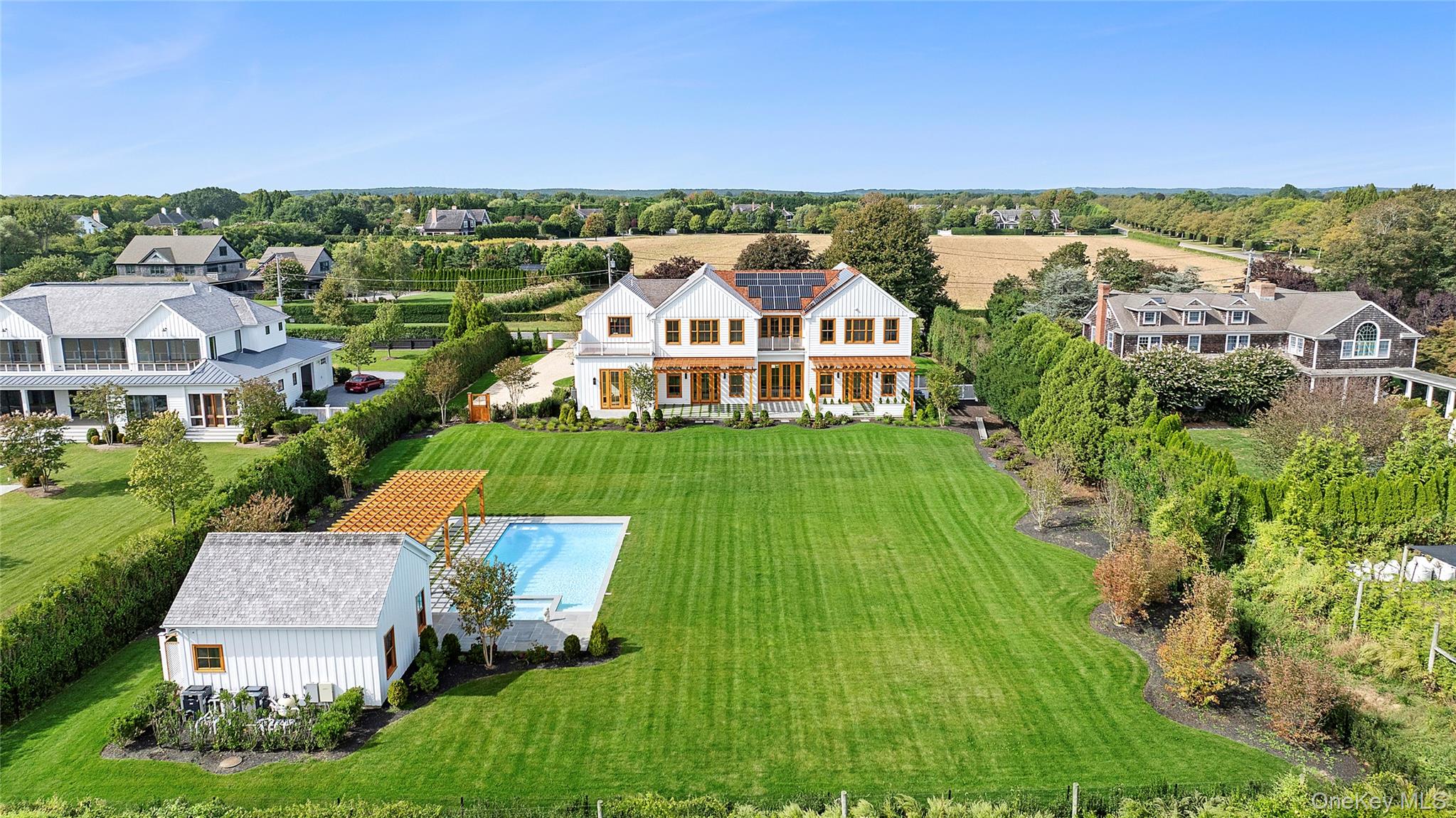 522 Wickapogue Road Southampton, NY 11968 - Photo 4 of 49 an aerial view of a house with a garden