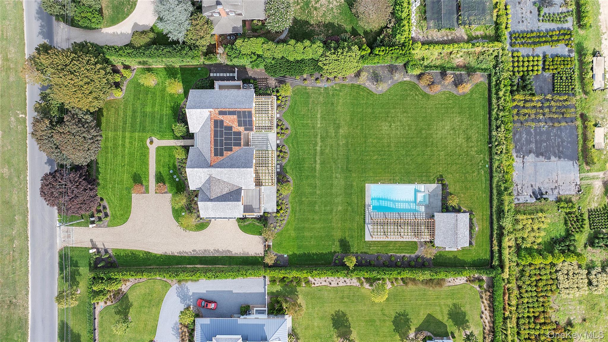 522 Wickapogue Road Southampton, NY 11968 - Photo 6 of 49 an aerial view of residential houses with outdoor space and street view