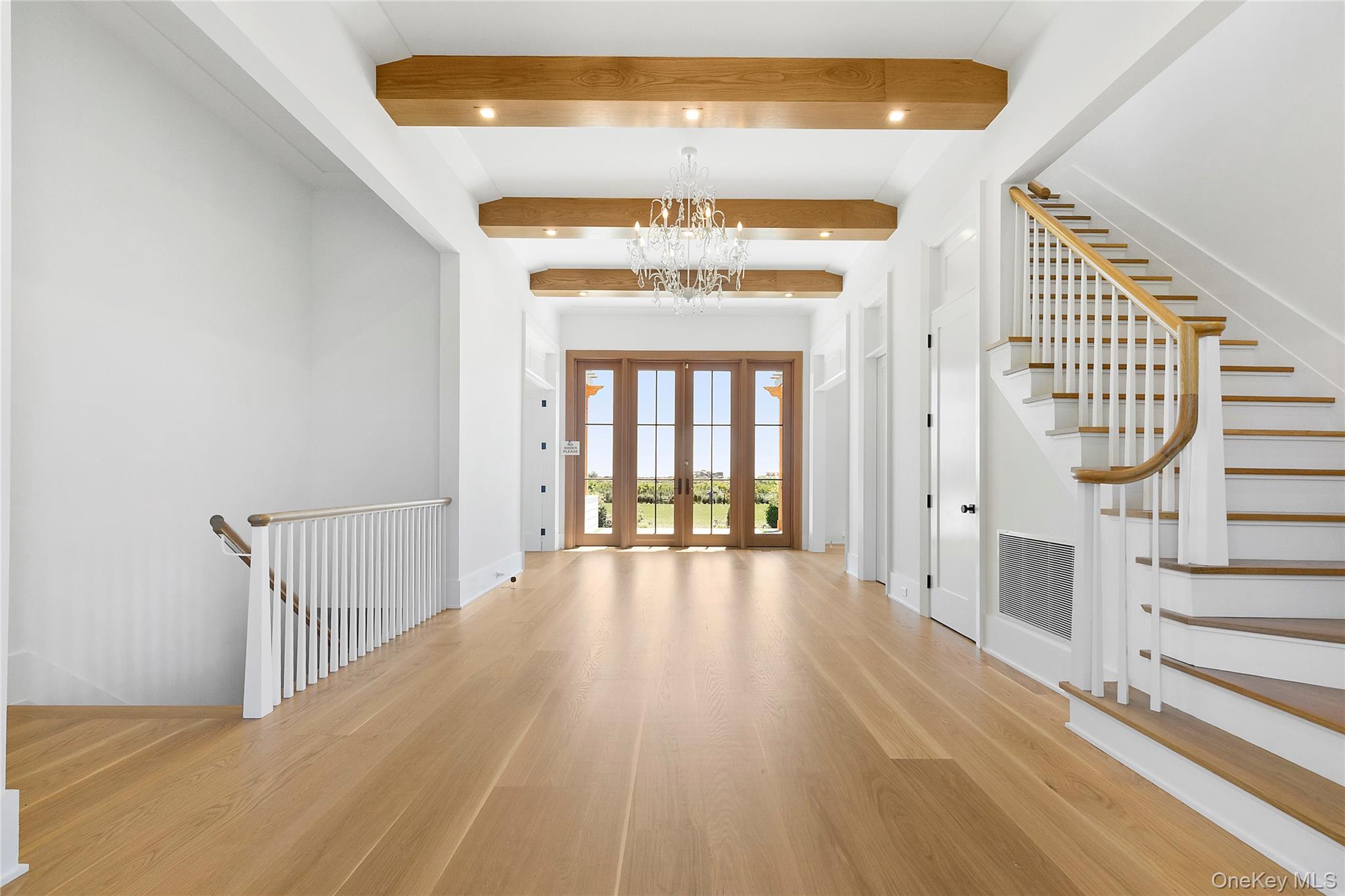 522 Wickapogue Road Southampton, NY 11968 - Photo 7 of 49 a view of an entryway with wooden floor