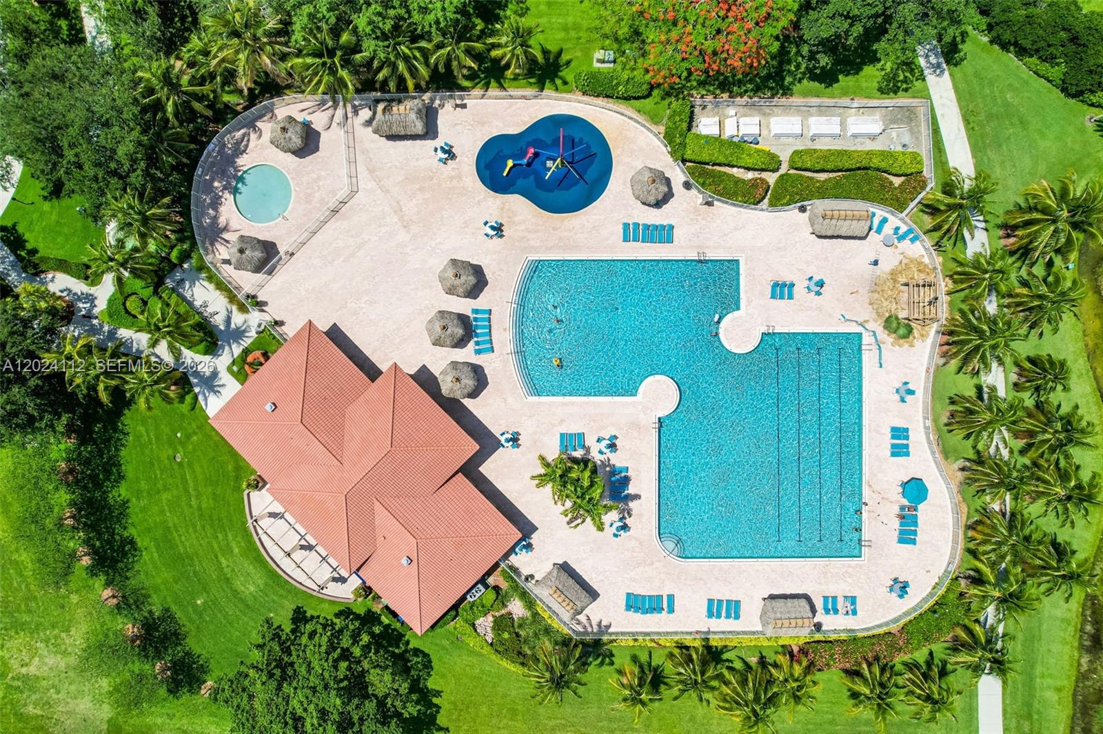 4366 Mahogany Ridge Drive Weston, FL 33331 - Photo 35 of 41 an aerial view of a house with a swimming pool