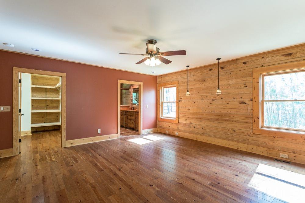 307 November Drive Durham, NC 27712 - Photo 20 of 30 wooden floor in an empty room with a window