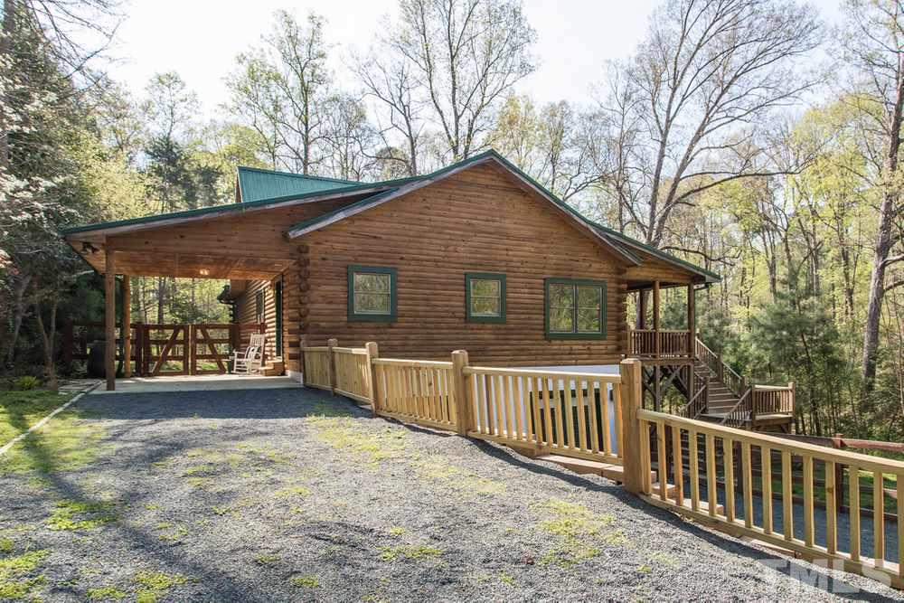 307 November Drive Durham, NC 27712 - Photo 3 of 30 a view of a house with a yard and deck