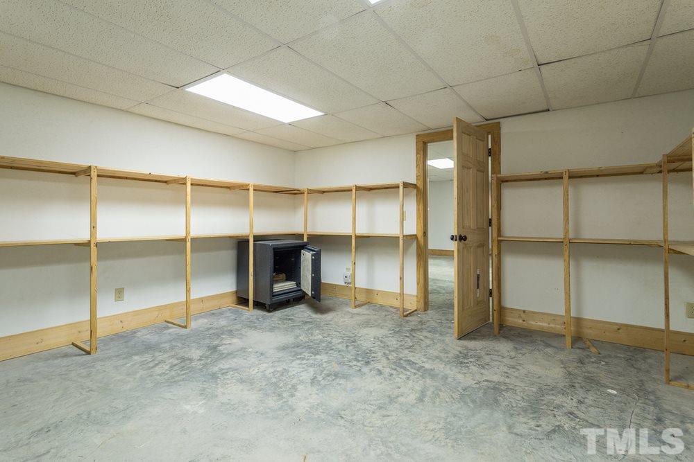 307 November Drive Durham, NC 27712 - Photo 29 of 30 an empty room with closet and mirror