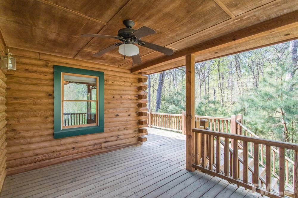 307 November Drive Durham, NC 27712 - Photo 4 of 30 a view of outdoor room with wooden floor fan and windows