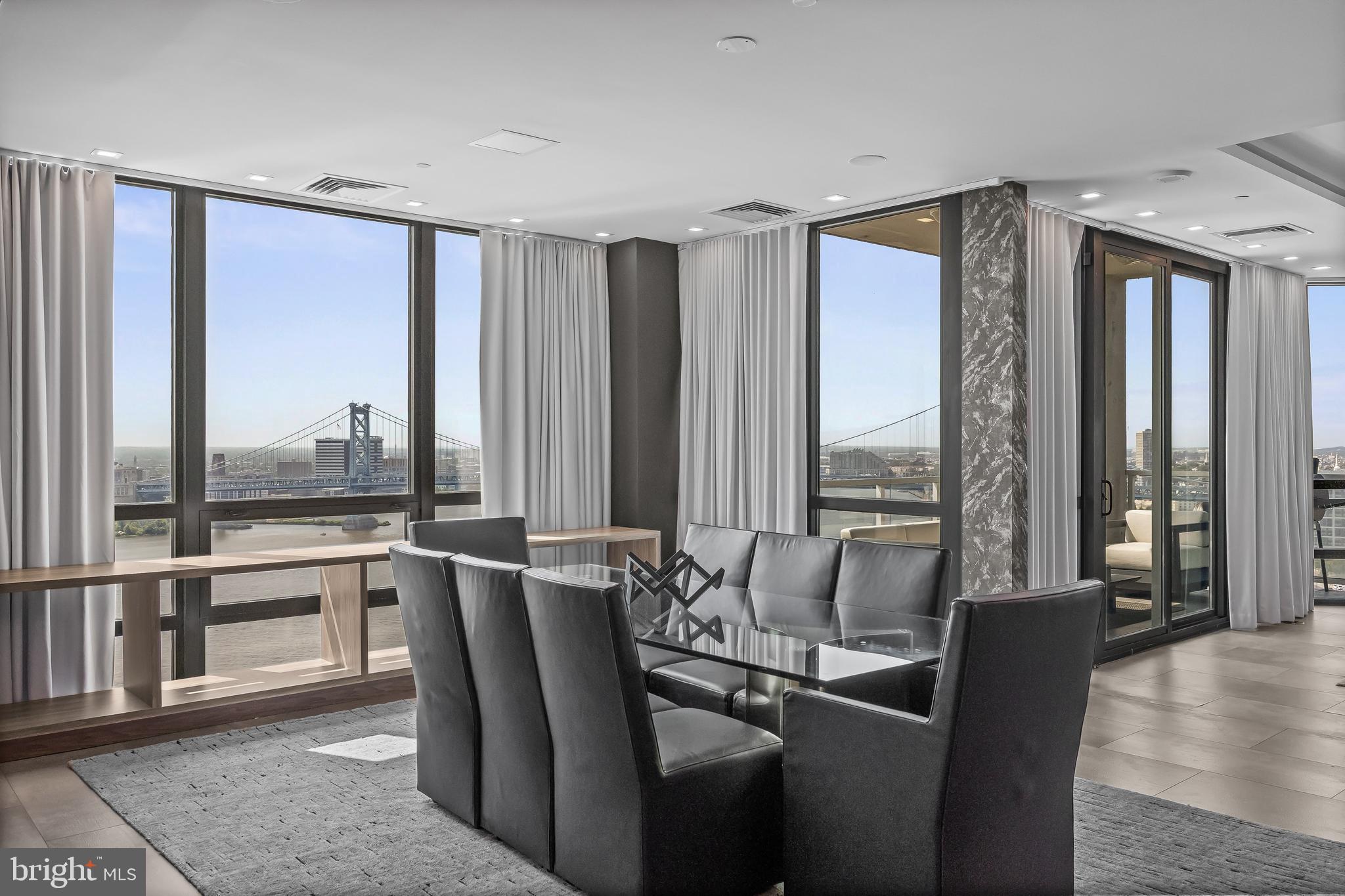 901 North Penn Street, Unit P24012 Philadelphia, PA 19123 - Photo 14 of 59 a view of a livingroom with furniture and window
