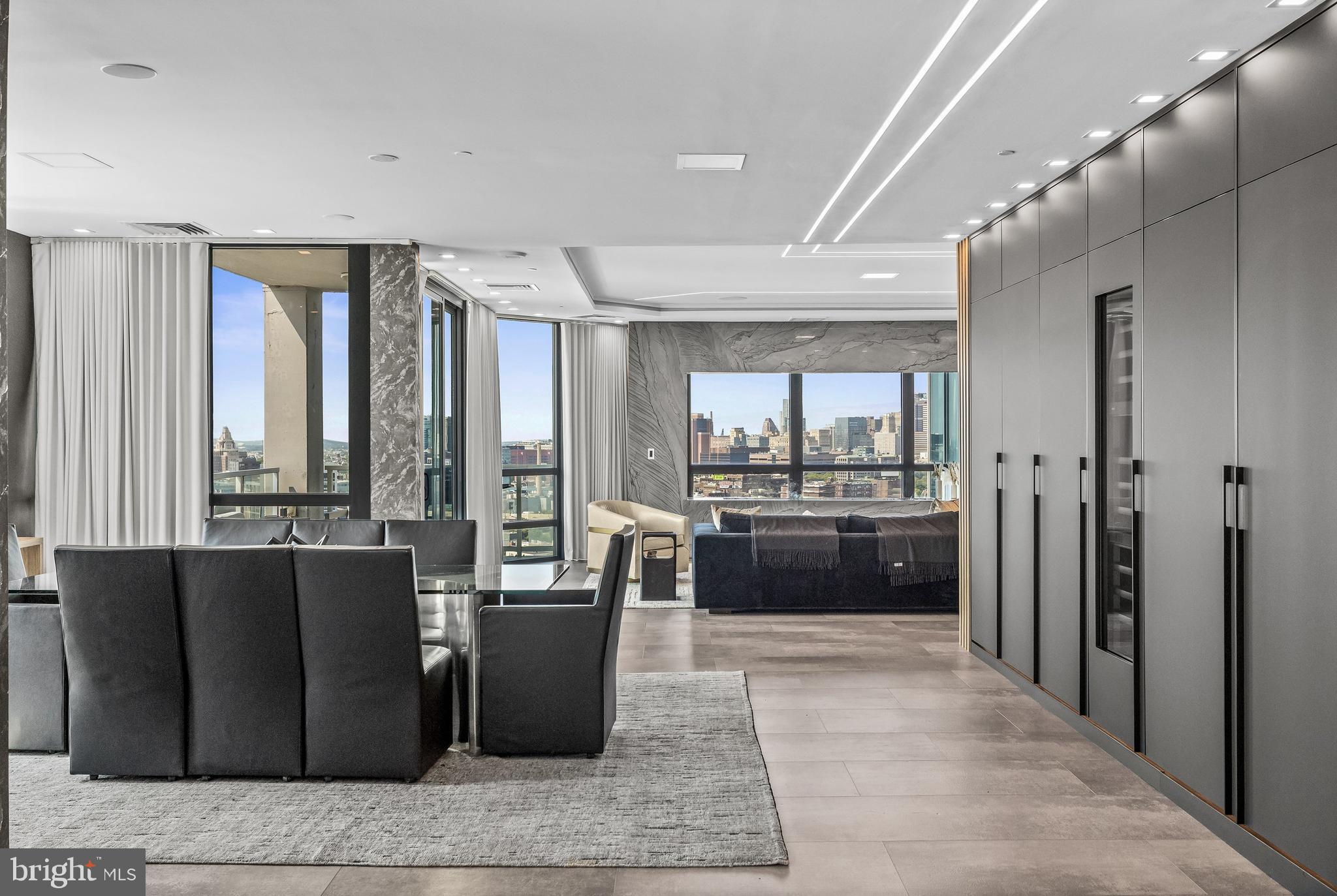 901 North Penn Street, Unit P24012 Philadelphia, PA 19123 - Photo 15 of 59 a living room with stainless steel appliances kitchen island granite countertop a refrigerator a sink a stove top oven and a dishwasher
