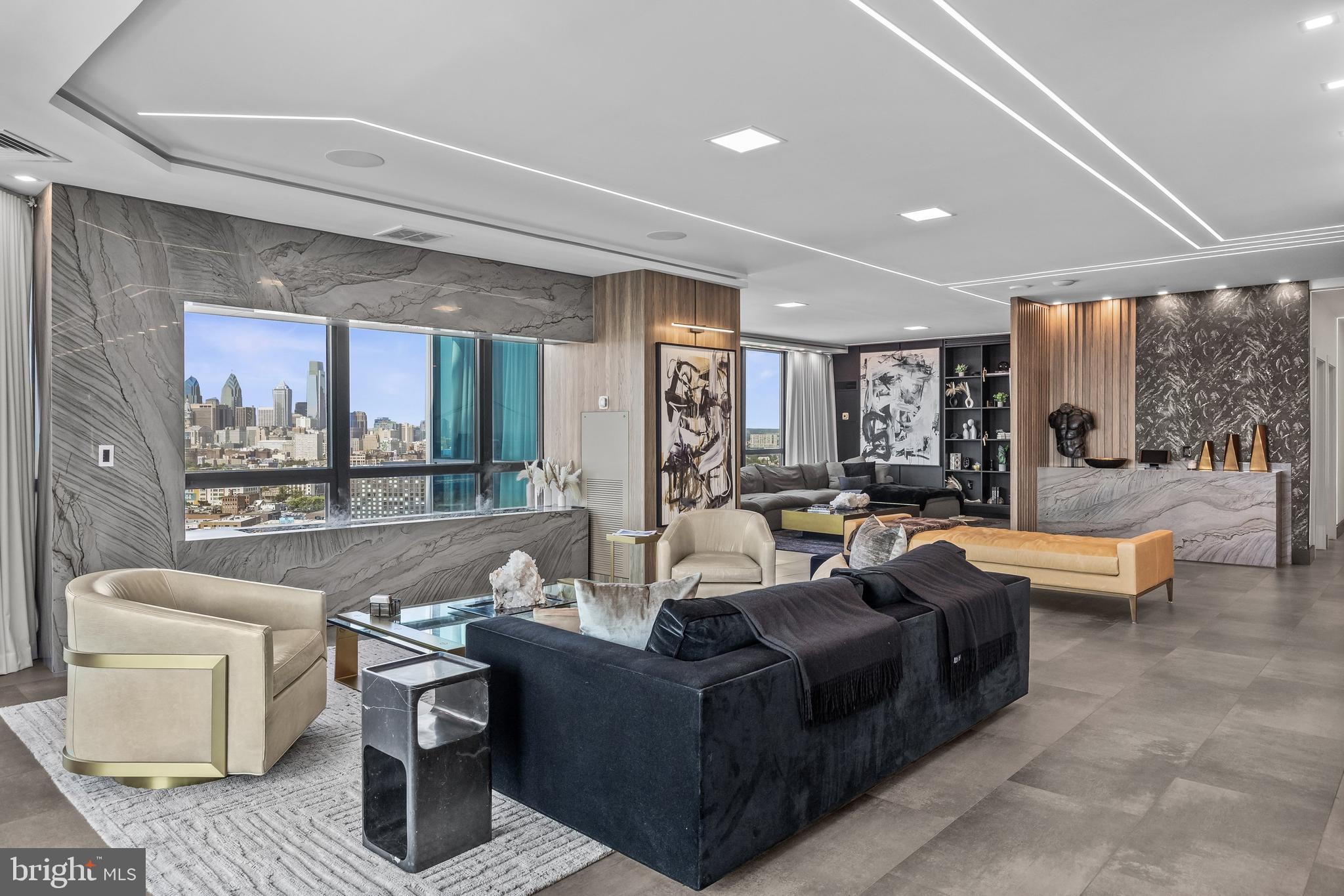 901 North Penn Street, Unit P24012 Philadelphia, PA 19123 - Photo 21 of 59 a living room with furniture and a large window