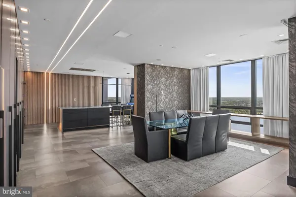 a large room with a large window and glass door