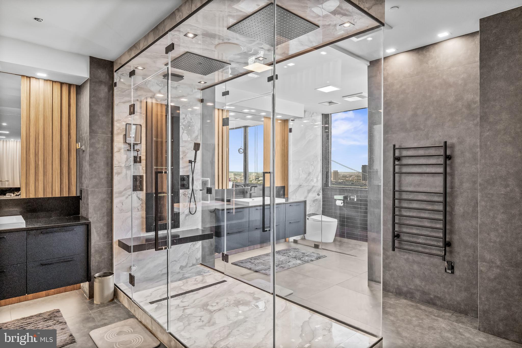 901 North Penn Street, Unit P24012 Philadelphia, PA 19123 - Photo 29 of 59 a large room with a large window and glass door