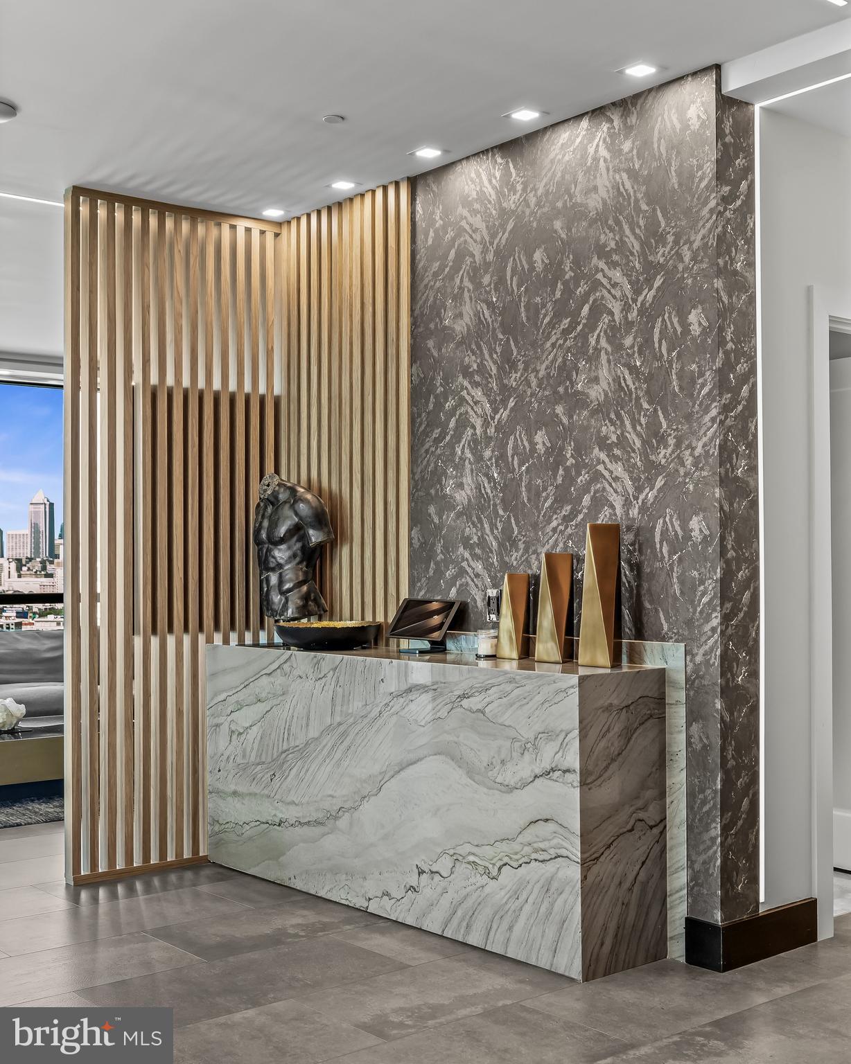 901 North Penn Street, Unit P24012 Philadelphia, PA 19123 - Photo 8 of 59 a view of a living room and a garage