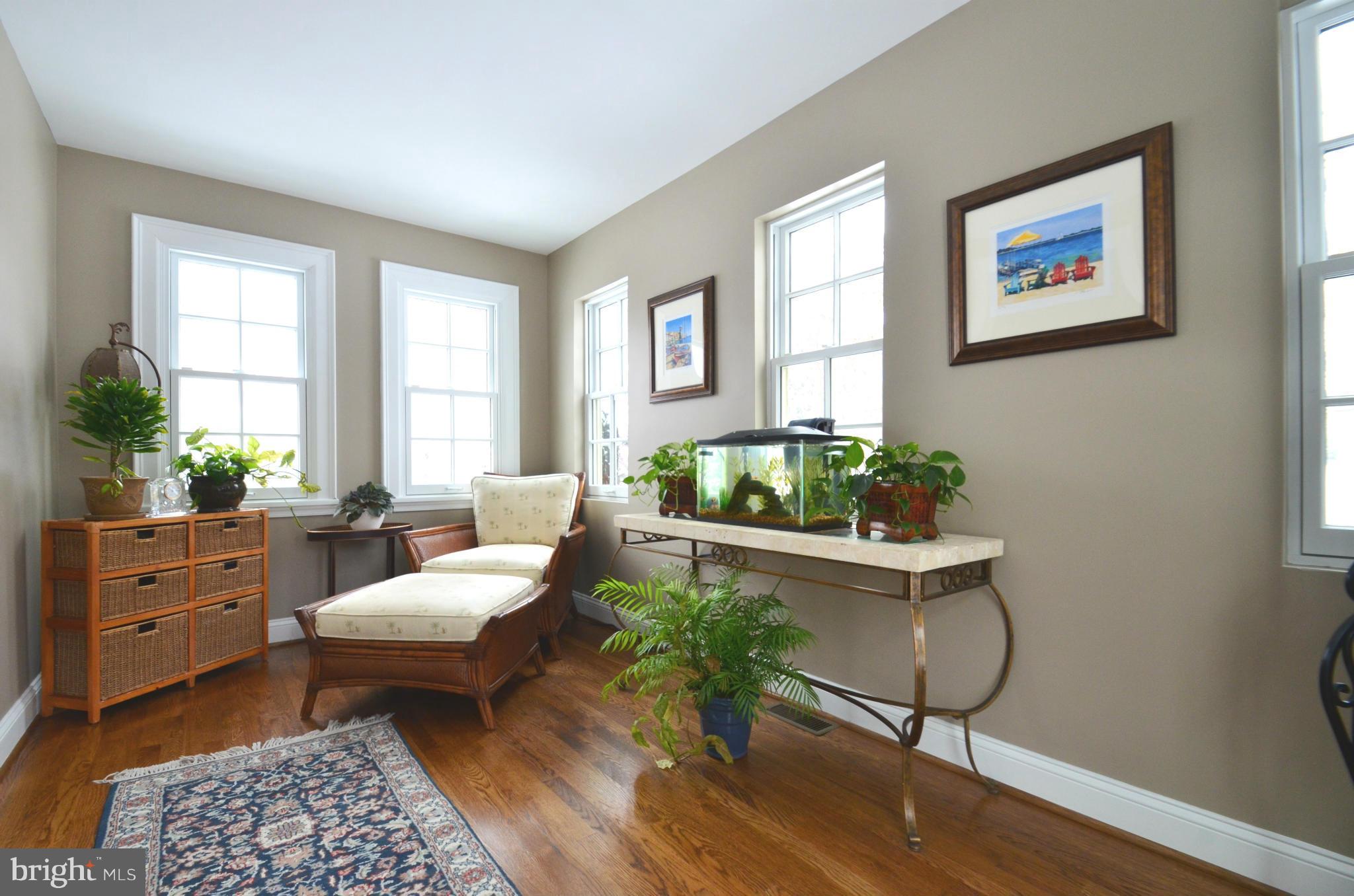 307 East Highfield Road Baltimore, MD 21218 - Photo 12 of 30 a living room with furniture and a potted plant