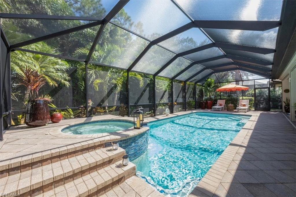 7263 Acorn Way Naples, FL 34119 - Photo 24 of 34 a view of yard with outdoor seating