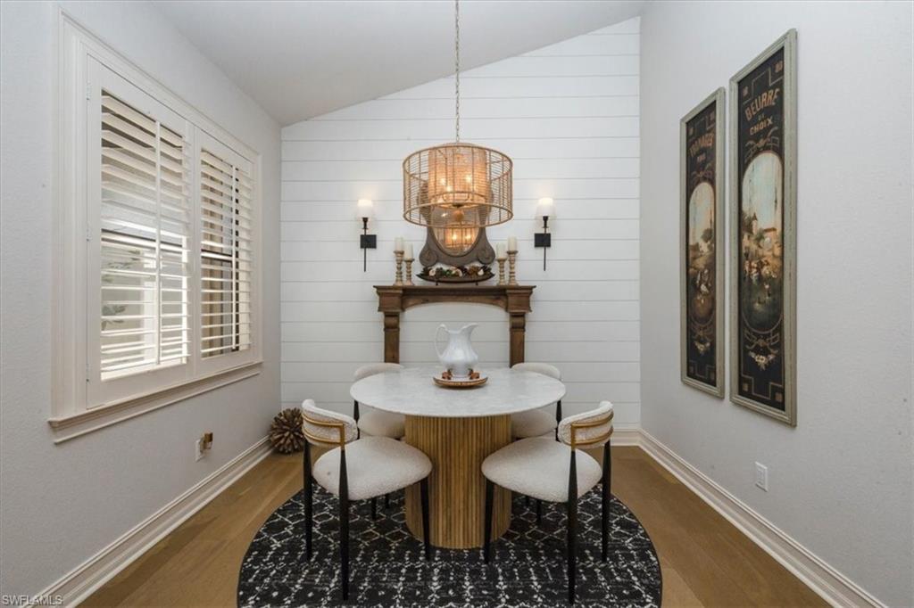 7263 Acorn Way Naples, FL 34119 - Photo 9 of 34 a dining room with furniture and window