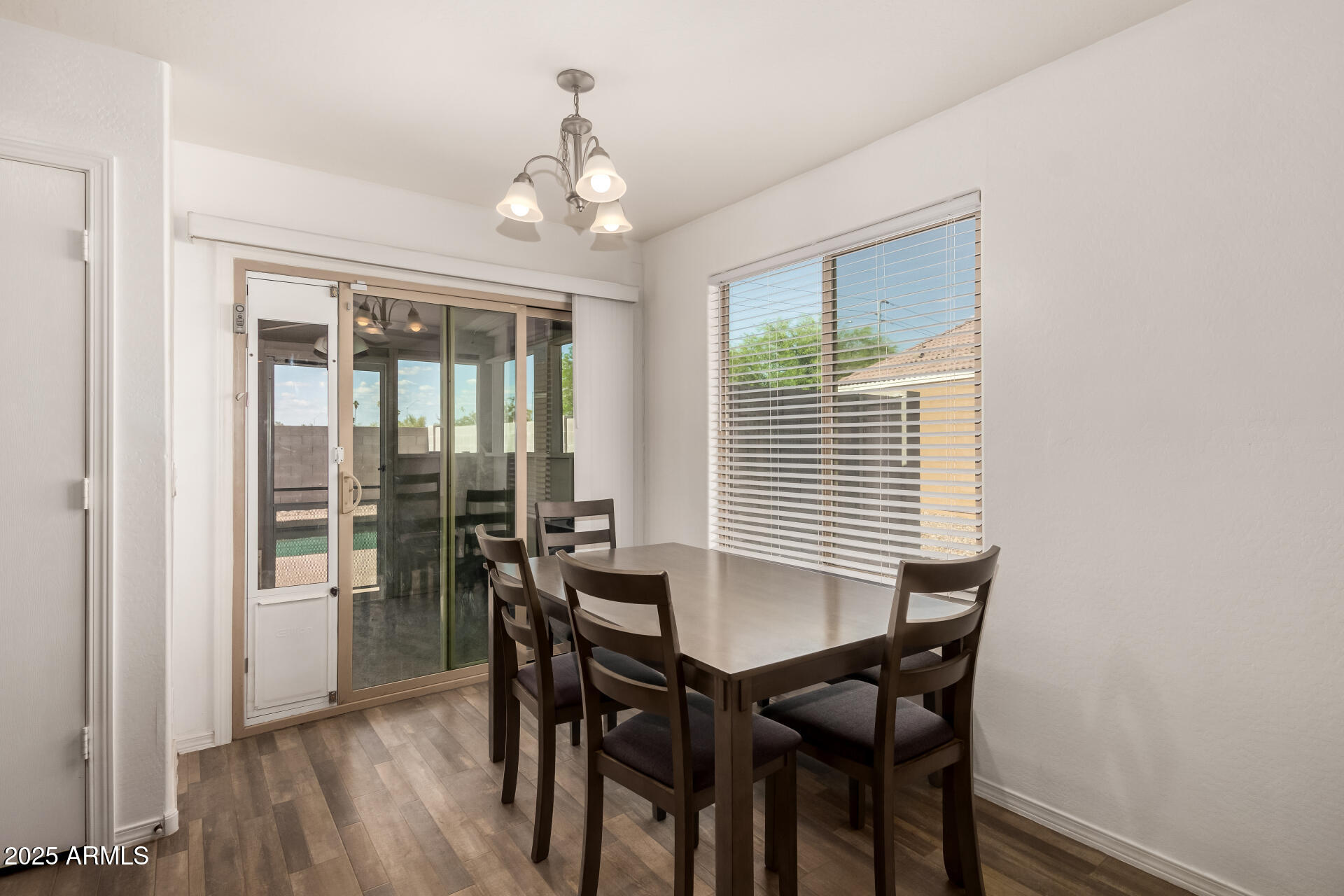 910 Prior Avenue Coolidge, AZ 85128 - Photo 5 of 22 a view of a dining room with furniture and window