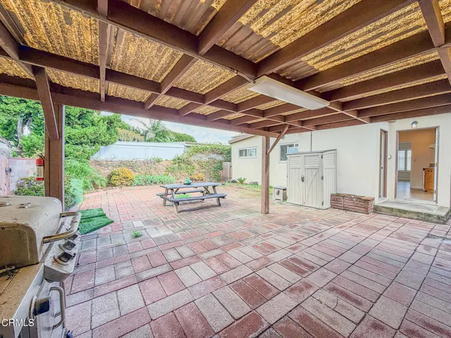 a view of a porch with wooden floor