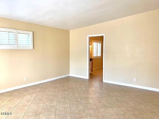a kitchen with a sink cabinets and appliances