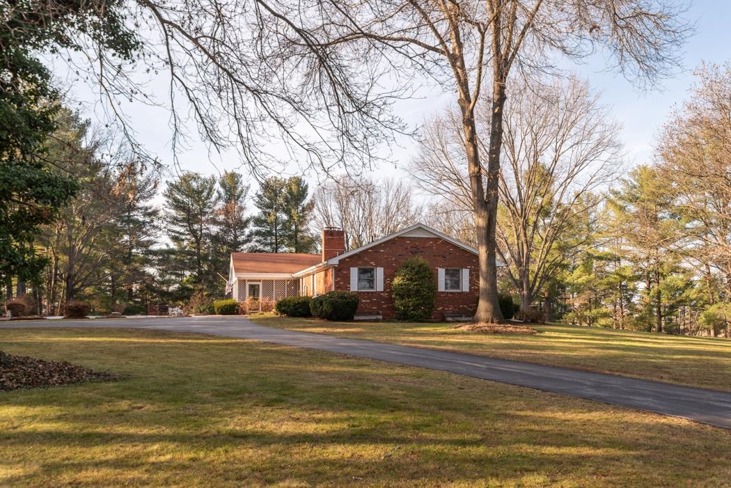 198 Baynes Road Waynesboro, VA 22980 - Photo 11 of 74 a front view of residential houses with yard and trees