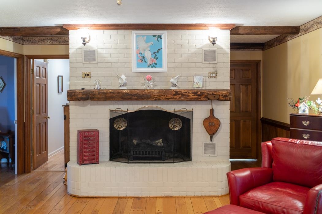 198 Baynes Road Waynesboro, VA 22980 - Photo 17 of 74 a living room with furniture and a fireplace