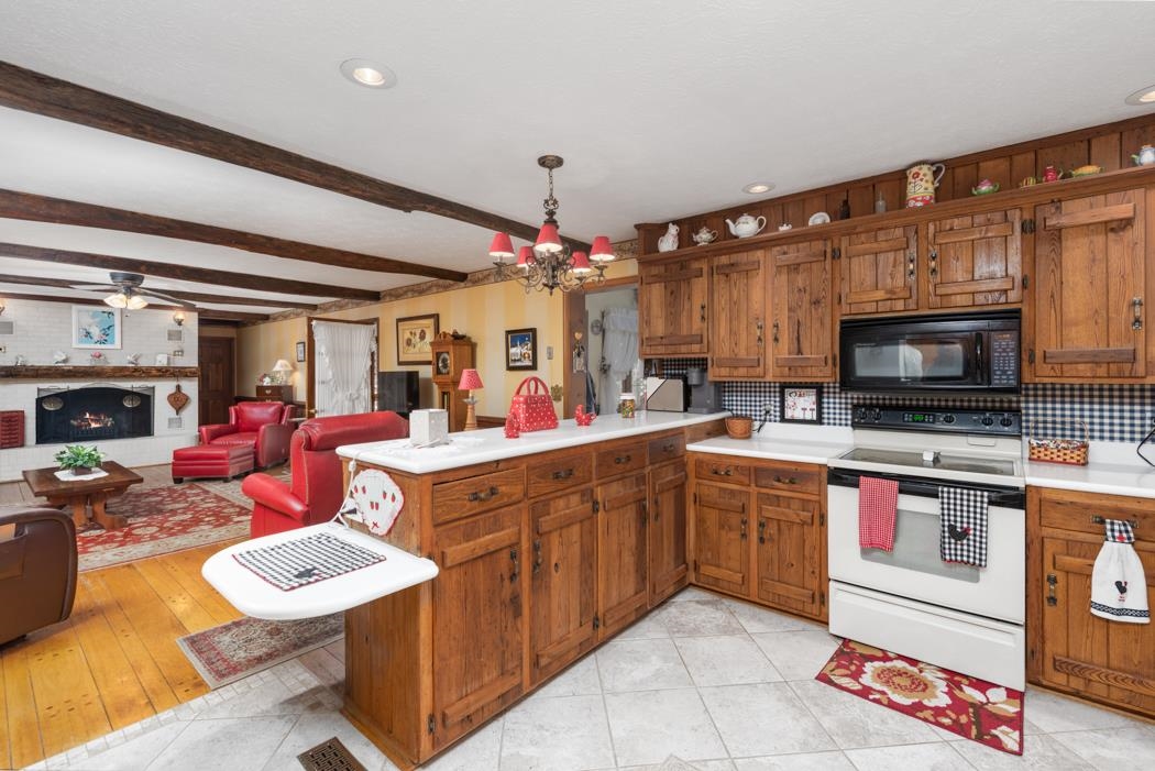 198 Baynes Road Waynesboro, VA 22980 - Photo 18 of 74 a kitchen with a sink and a stove top oven