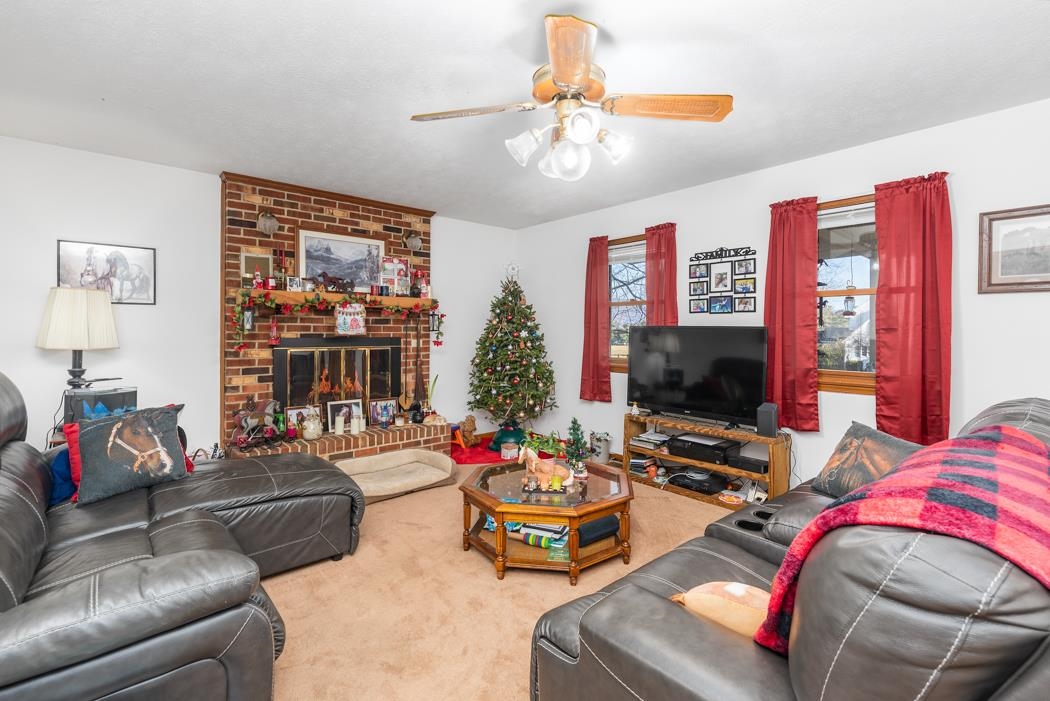 198 Baynes Road Waynesboro, VA 22980 - Photo 71 of 74 a living room with furniture and a flat screen tv