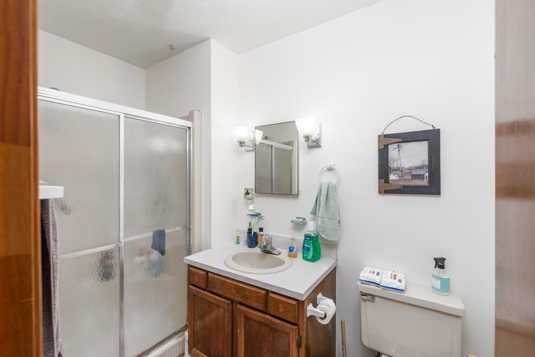 198 Baynes Road Waynesboro, VA 22980 - Photo 74 of 74 a bathroom with a sink toilet and mirror
