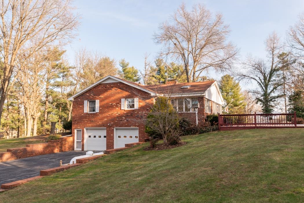 198 Baynes Road Waynesboro, VA 22980 - Photo 10 of 74 a front view of a house with a yard and garage