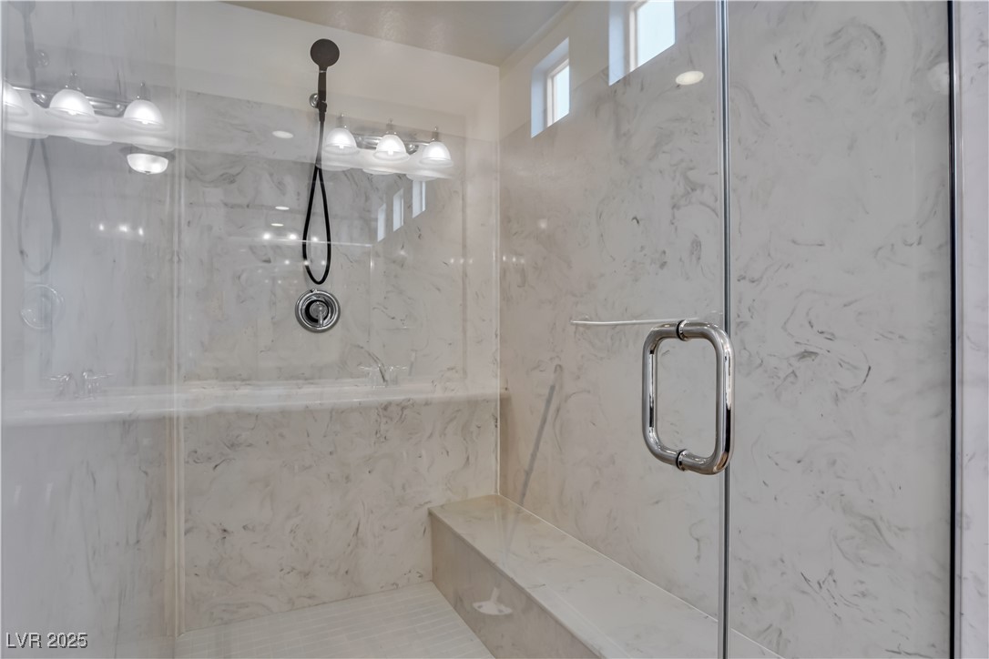 10073 Icicle Ridge Las Vegas, NV 89141 - Photo 12 of 23 Full bathroom with a marble finish shower