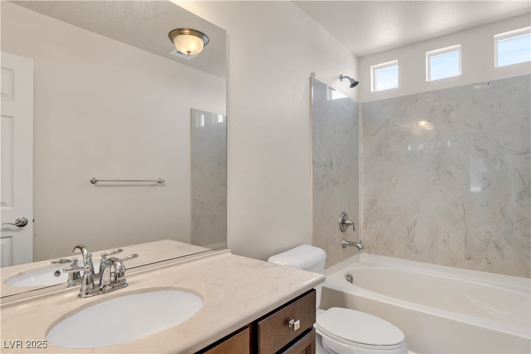 10073 Icicle Ridge Las Vegas, NV 89141 - Photo 23 of 23 Full bathroom with vanity and bathing tub / shower combination