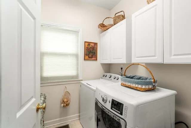 a kitchen with a cabinets and window