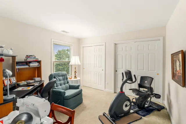 a room with furniture and a window