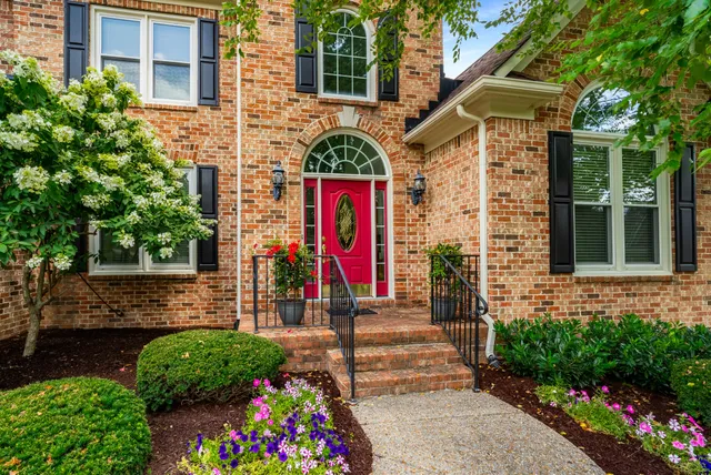 a street sign on the side of building