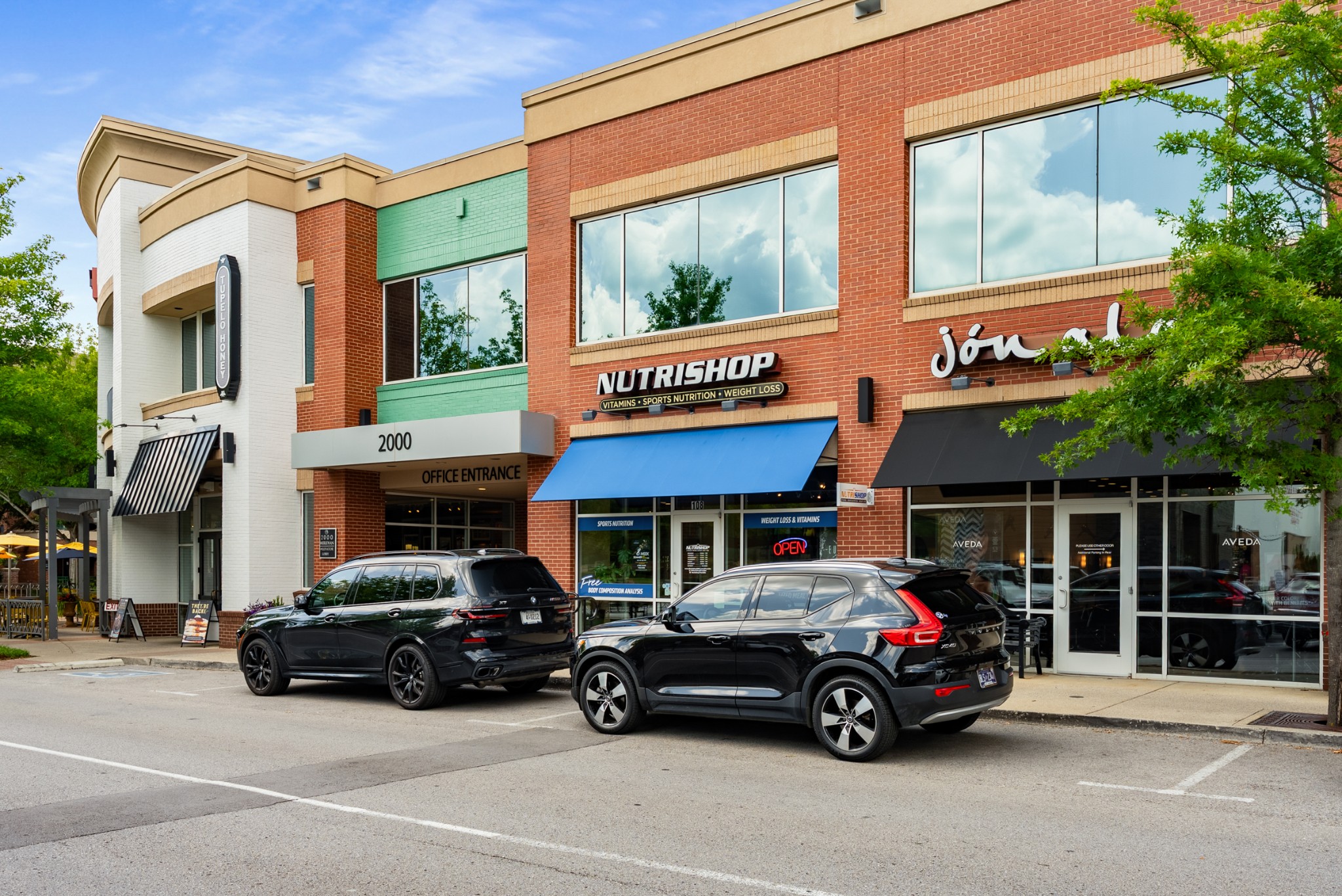 446 Savannah Way Franklin, TN 37067 - Photo 29 of 30 a car parked in front of a building